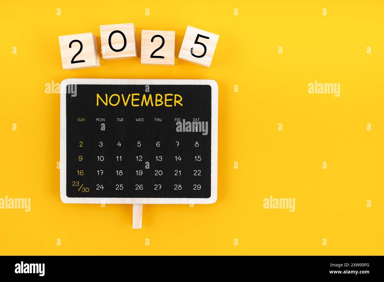 Calendar For November 2025 In Black Chalkboard With Copy Space On A Yellow Color Background Stock Photo Alamy