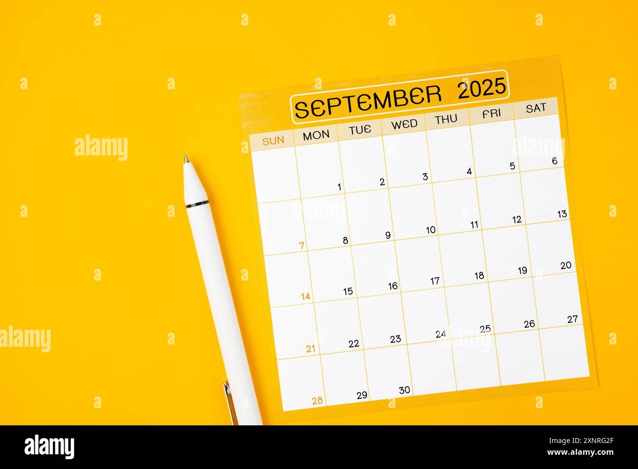 September 2025 Monthly Calendar For 2025 Year With Pen On Yellow Color Background Stock Photo Alamy